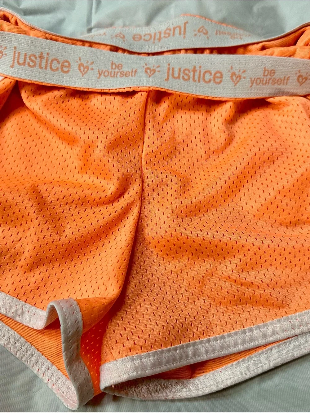 Justice Neon Orange Mesh Sports Shorts with White Trim